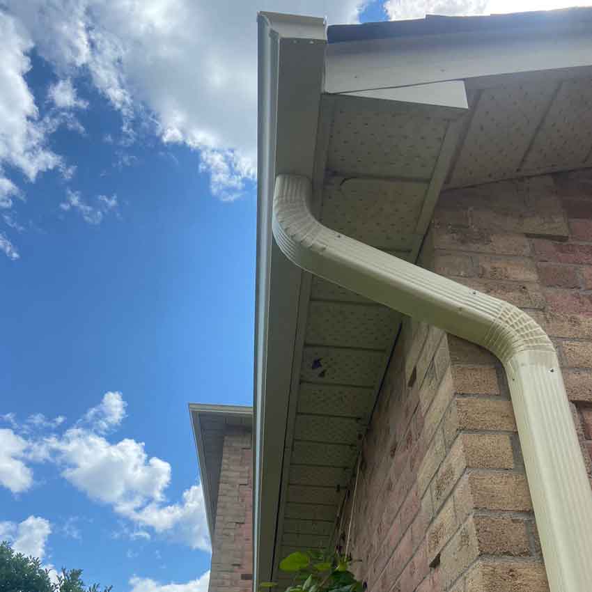 House with new gutter and downspout installed in Toronto